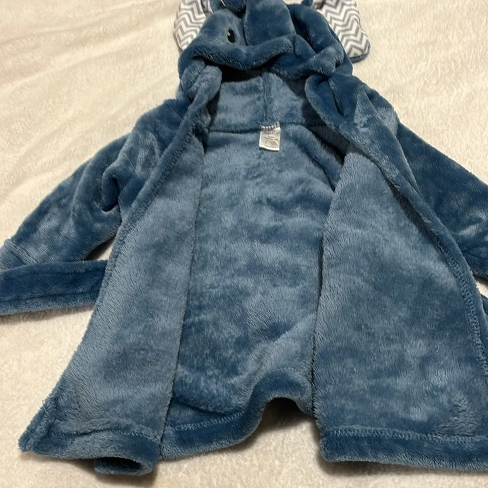 Very soft baby elephant robe with hood and tie. Blue in color! Very warm & soft